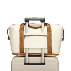 KONO Stækkanleg vatnsheld BEIGE og Brún Stækanleg , vatnsheld og með auka snyrtibuddu Stærð H 30 cm B 40 cm Þ 22 cm